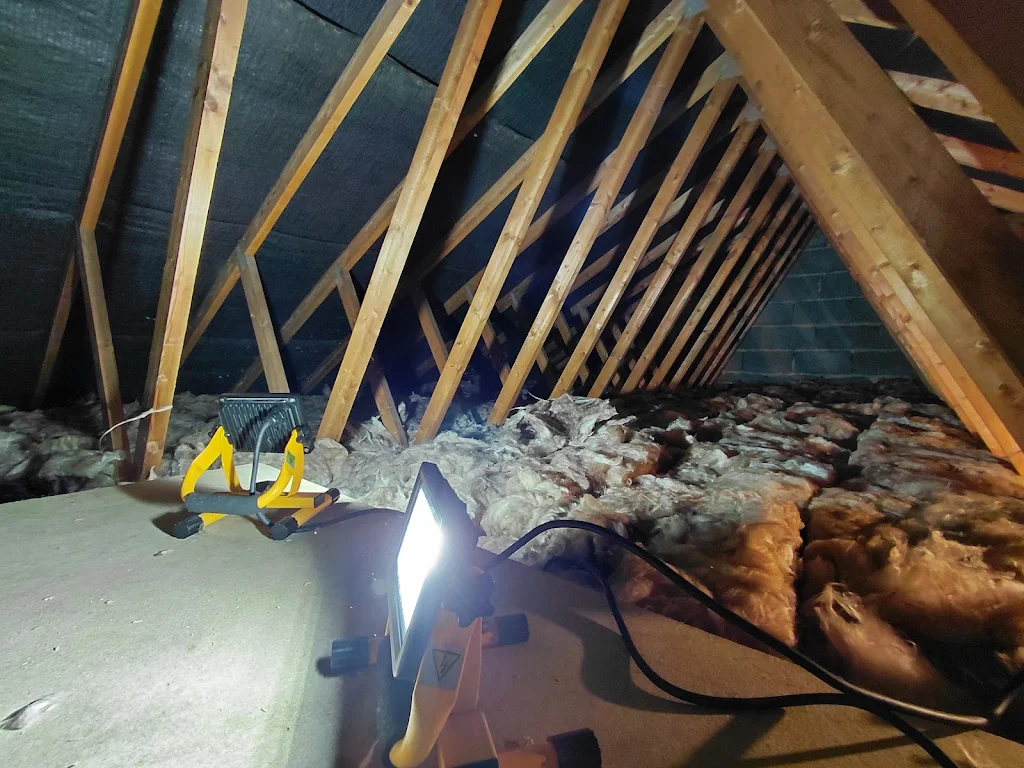 A freshly insulated loft with mineral wool and raised boarding